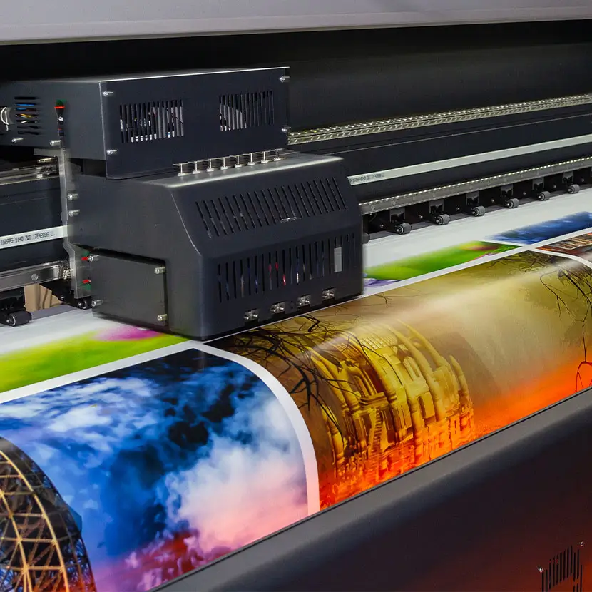 Large industrial printer producing colorful printed material for advanced printing systems